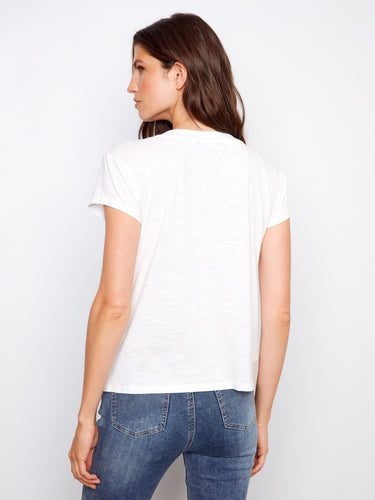 White tee with soft fabric and classic V-neckline, ideal for layering by Charlie B.
