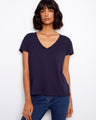 Elegant V-neck top in soft cotton, perfect for casual outings. The drop shoulder design adds a relaxed vibe. By Charlie B.