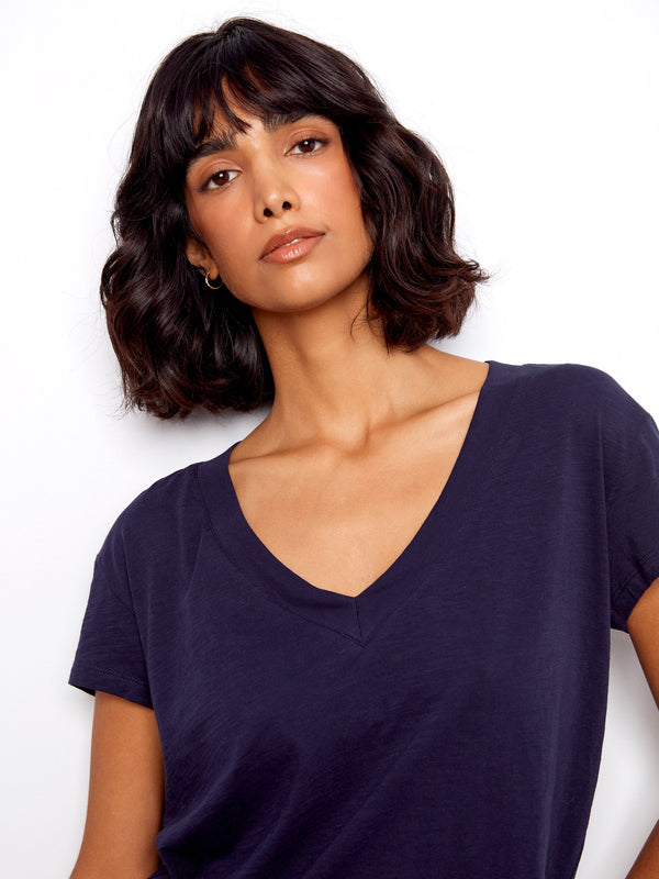 Experience comfort with this lightweight cotton top featuring a stylish V-neck. Ideal for everyday wear. By Charlie B.