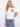Experience comfort and style with this white tee, crafted from pure cotton and featuring a chic crochet pocket by Charlie B.