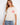 This beige top features a stylish crew neckline, making it a versatile piece for any wardrobe. Crafted by Charlie B.