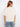 A classic crew neckline defines this chic beige tee, offering timeless appeal and comfort. Created by Charlie B.