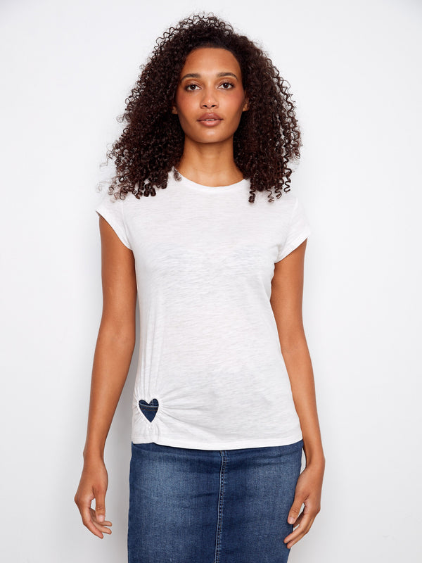 Featuring a classic crew neckline, this white top is versatile and easy to pair with various outfits. Created by Charlie B.