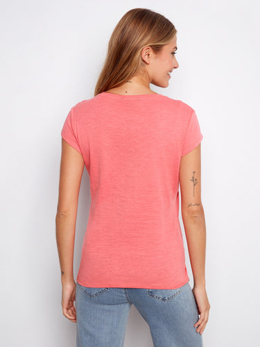 Enjoy the classic short sleeves on this trendy top, ideal for layering or wearing alone. Experience quality with Charlie B.