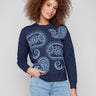 Heather denim sweater featuring paisley embroidery and a comfortable crew neck, perfect for any occasion by Charlie B.