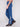 Crafted from stretch denim material, these indigo jeans feature elegant paisley embroidery by Charlie B.