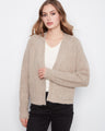 Stylish cardigan featuring raglan sleeves that offer a relaxed fit and modern look, designed by Charlie B.