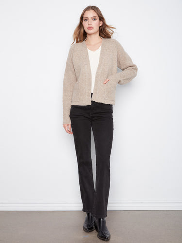 Comfortable cardigan with patch pockets, combining practicality and fashion effortlessly. Designed thoughtfully by Charlie B.