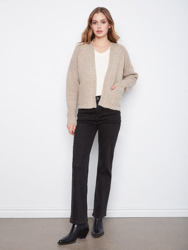Cozy cardigan with an open-front design, perfect for layering over any outfit. Crafted for comfort and style by Charlie B.