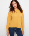 This sweater features a comfortable crew neck design, perfect for casual outings. By Charlie B.