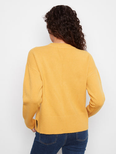 Drop shoulders give this sweater a relaxed silhouette, enhancing its casual appeal. By Charlie B.