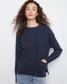 Navy blue sweater with a classic crew neck, perfect for casual outings. Crafted in soft fabric for comfort. By Charlie B.