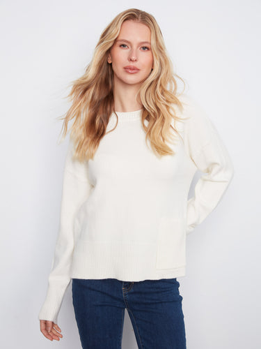 Soft sweater with a classic crew neck design, offering timeless elegance for any occasion. Perfectly crafted by Charlie B.