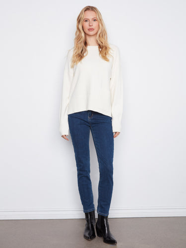 Chic sweater with a convenient patch pocket, blending functionality and fashion effortlessly. A creation by Charlie B.