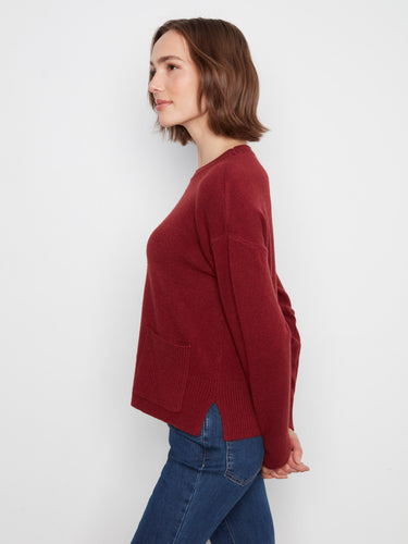 Elegant red sweater designed with side slits for added movement and sophistication in every wear by Charlie B.