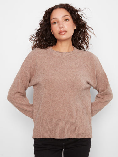 Stylish sweater designed with drop shoulders to enhance its relaxed fit and modern look. By Charlie B.