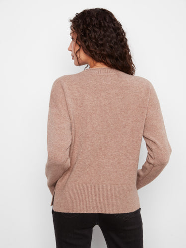 Classic sweater crafted with a crew neck, offering timeless appeal and everyday versatility. By Charlie B.