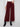 These pants offer a cropped length with two front patch pockets, adding practicality to style by Charlie B.