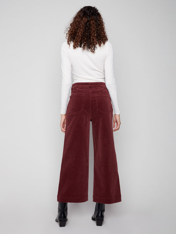 Corduroy flare pants in cabernet with a flattering fit and elegant design for any occasion by Charlie B.