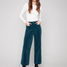 Cropped corduroy pants in evergreen with two front patch pockets for a stylish touch by Charlie B.