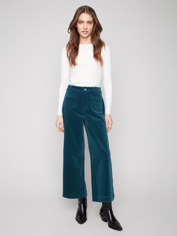 These pants feature two back patch pockets adding both style and functionality by Charlie B.