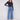 Stylish medium blue jeans with a flare fit and modern patch pockets, crafted from stretch denim for comfort by Charlie B.