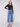Stylish medium blue jeans with a flare fit and modern patch pockets, crafted from stretch denim for comfort by Charlie B.