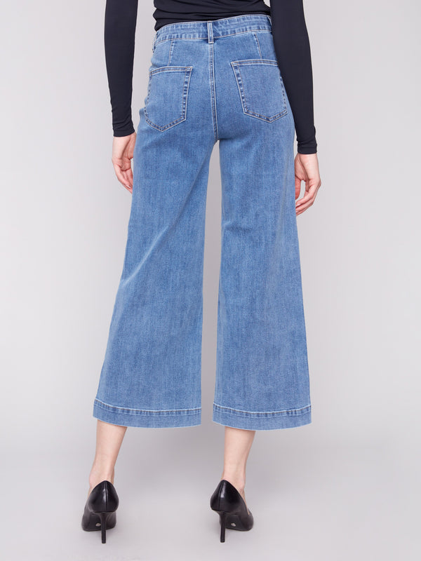 Medium blue jeans featuring a flattering flare fit and regular rise, perfect for casual or dressy occasions by Charlie B.