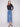 Medium blue cropped flare jeans with patch pockets, featuring a regular rise and modern fit by Charlie B.