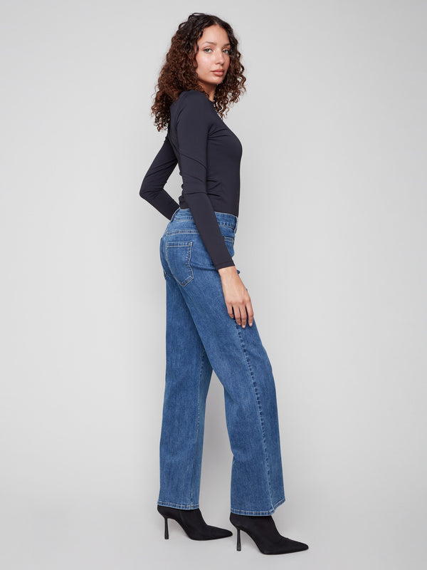 Designed with a regular rise, these jeans offer a classic fit that sits comfortably at the waist by Charlie B.