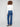 Stylish indigo jeans showcasing back pockets and stretch denim material for everyday wear by Charlie B.