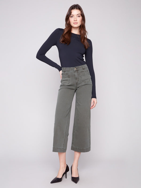 Spruce-colored pants featuring a stylish flare fit in stretch twill fabric by Charlie B.