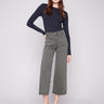 Spruce-colored pants featuring a stylish flare fit in stretch twill fabric by Charlie B.