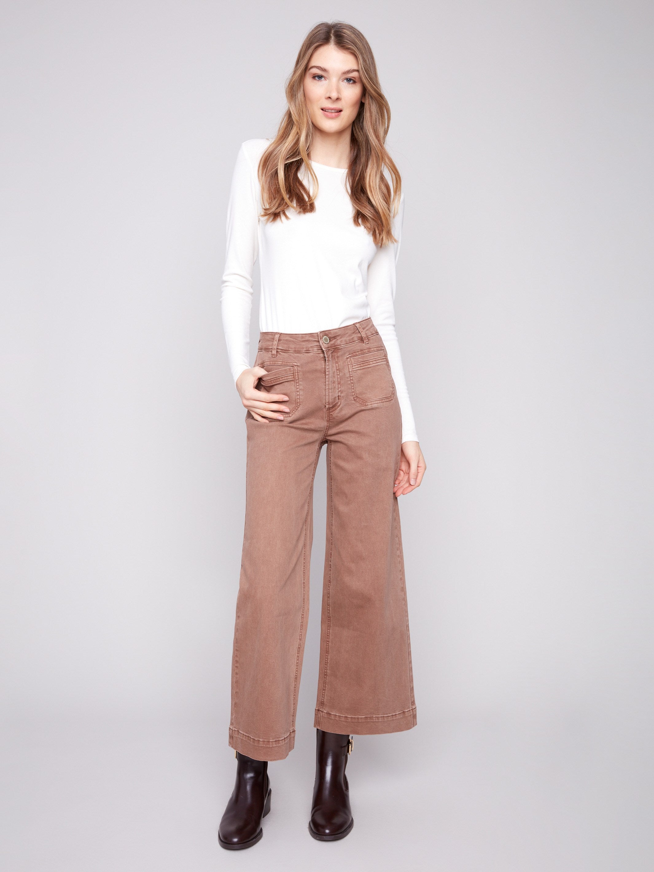 Truffle-colored pants featuring a stylish flare fit, perfect for a chic look by Charlie B.