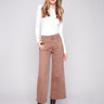 Truffle-colored pants featuring a stylish flare fit, perfect for a chic look by Charlie B.