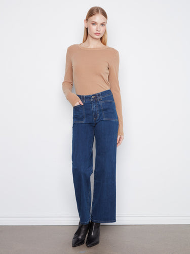 The regular rise of these jeans provides a flattering fit, making them an essential addition to your wardrobe. By Charlie B.