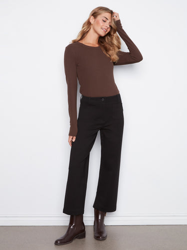 These pants feature a wide leg design, offering a relaxed and stylish fit. Made with quality fabric for comfort by Charlie B.