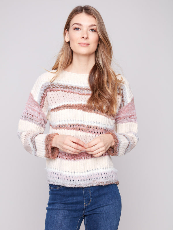Elegant drop shoulder style enhances the relaxed fit of this charming striped sweater by Charlie B.