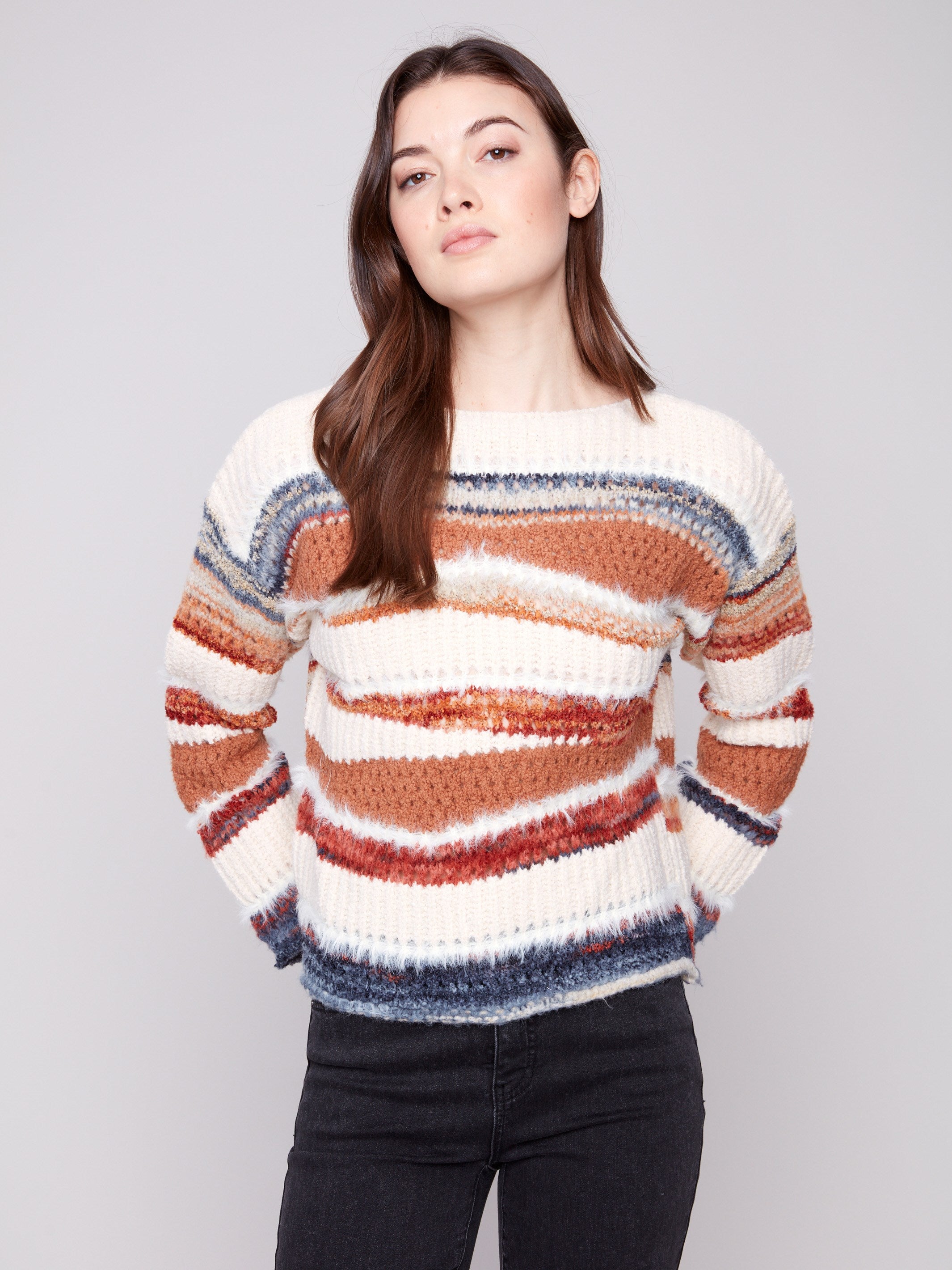 Striped patchwork knit sweater featuring a cozy crew neckline for added comfort by Charlie B.