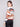 This unique patchwork knit showcases the drop shoulder design, enhancing its relaxed fit by Charlie B.