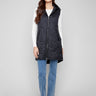 Black long vest with a sleek zipper front closure, offering both style and functionality by Charlie B.