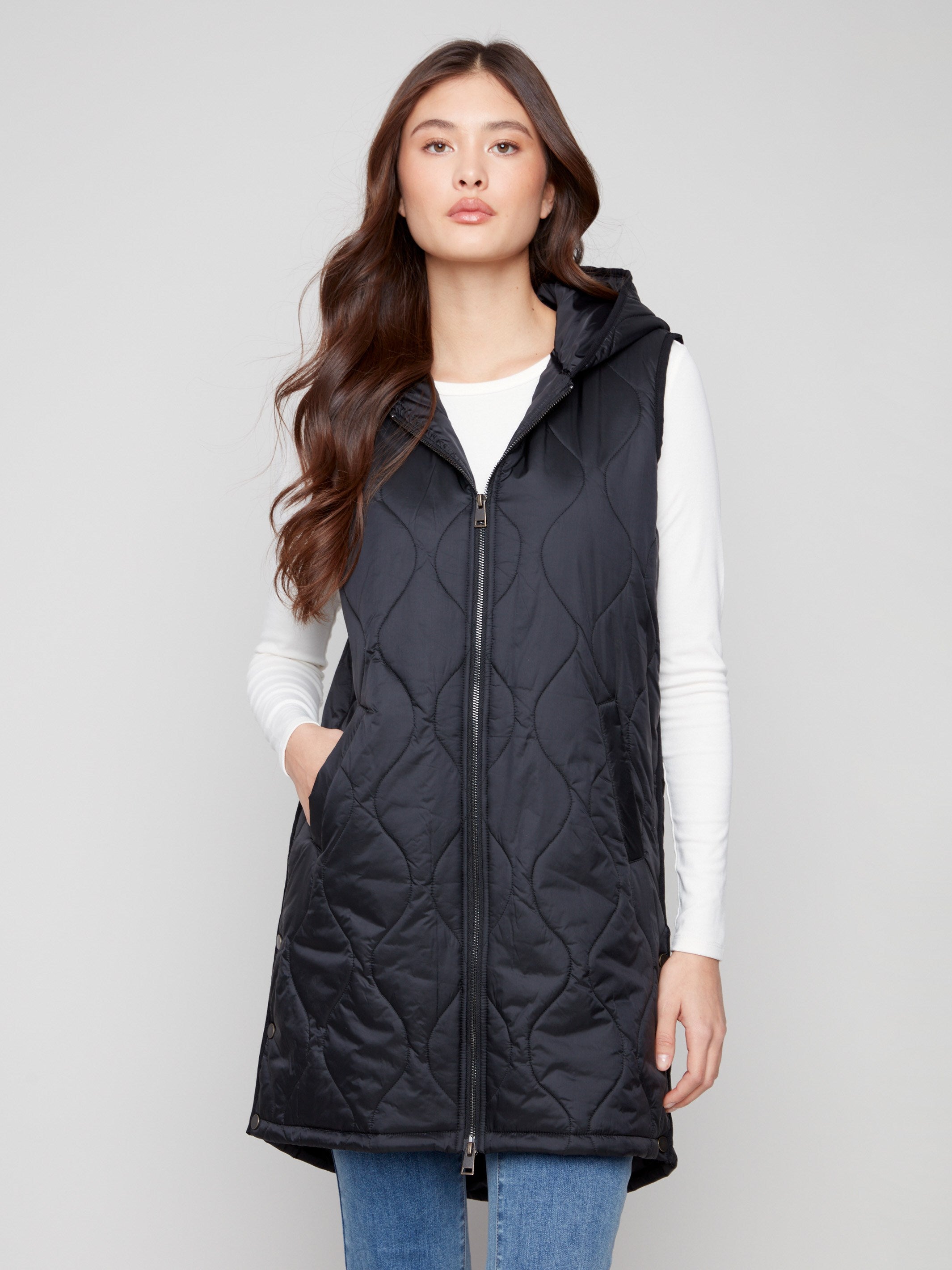 Elegant black vest featuring a quilted texture for added warmth and sophistication by Charlie B.