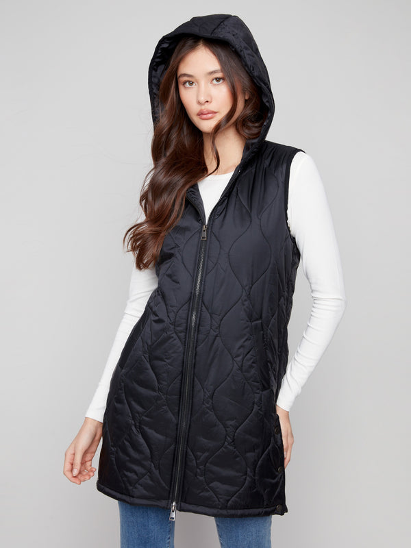 Long black vest with an elegant pearlized finish, adding a touch of shine to your look by Charlie B.