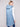 Elegant hooded vest showcasing side snap buttons for versatility by Charlie B.