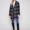 Navy plaid boucle coat featuring a tailored collar and stylish design by Charlie B.