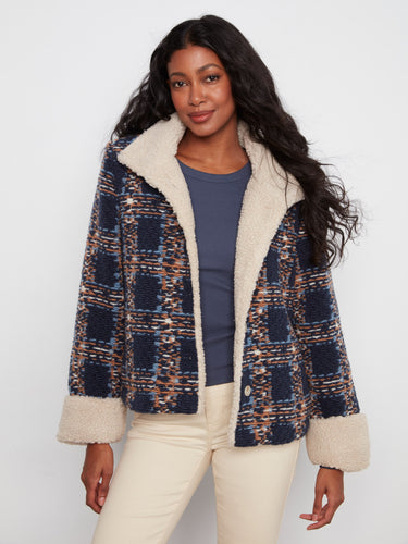 Navy plaid boucle jacket with a cozy stand collar and sherpa trim, featuring button-front closure by Charlie B.