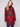 This cranberry plaid boucle knit coat features a classic button front closure, perfect for versatile styling by Charlie B.