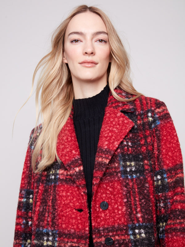 Add flair to any outfit with this cranberry plaid boucle knit coat featuring an elegant button front closure by Charlie B.