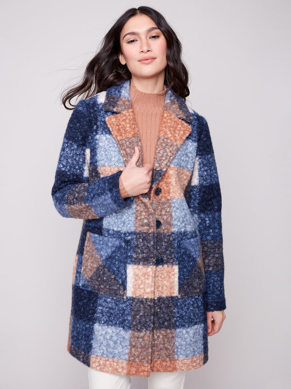 Stylish plaid coat with button front closure, adding a touch of sophistication to your wardrobe by Charlie B.