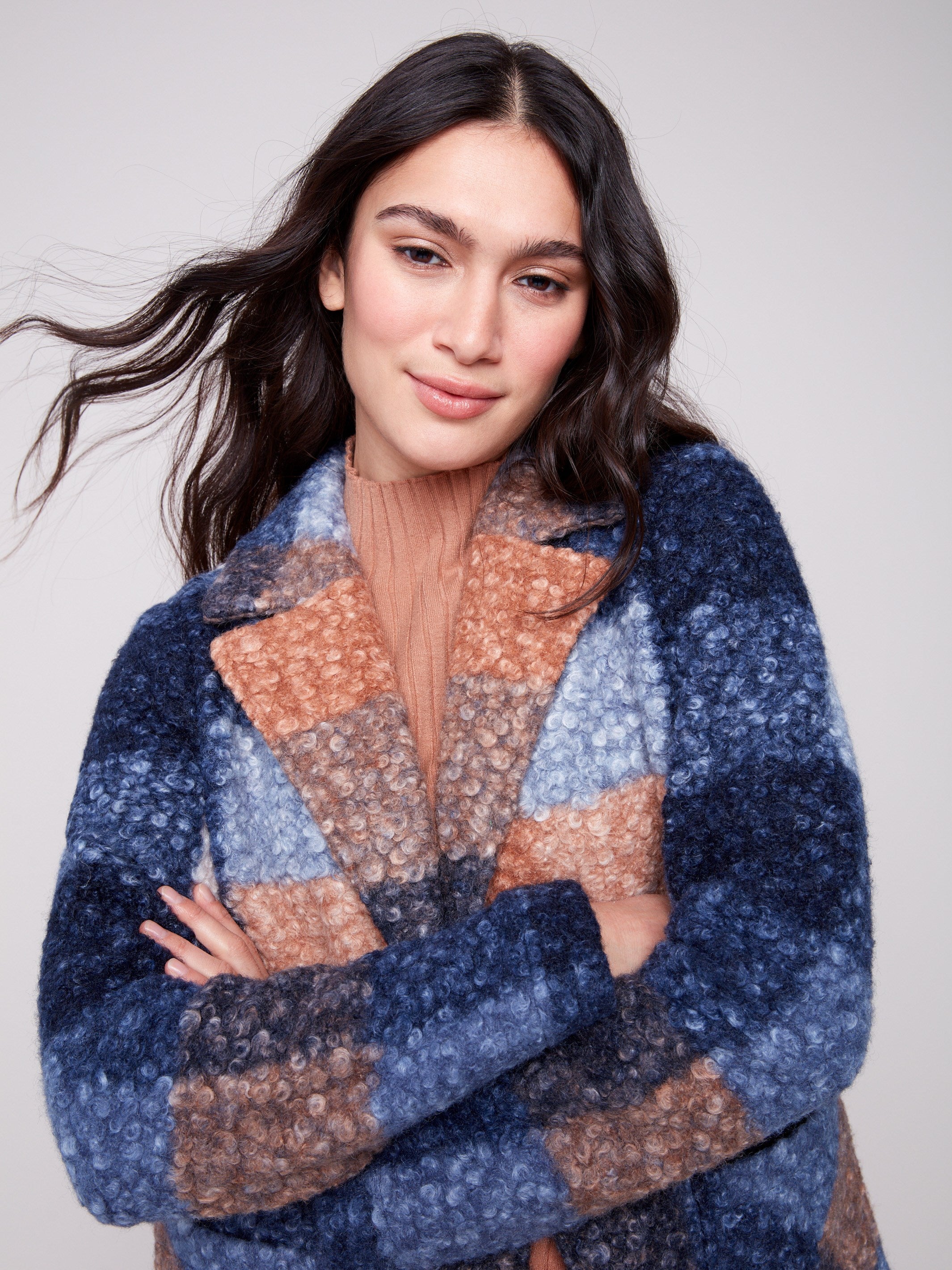 Elegant boucle knit coat with practical patch pockets, ideal for keeping essentials close by Charlie B.